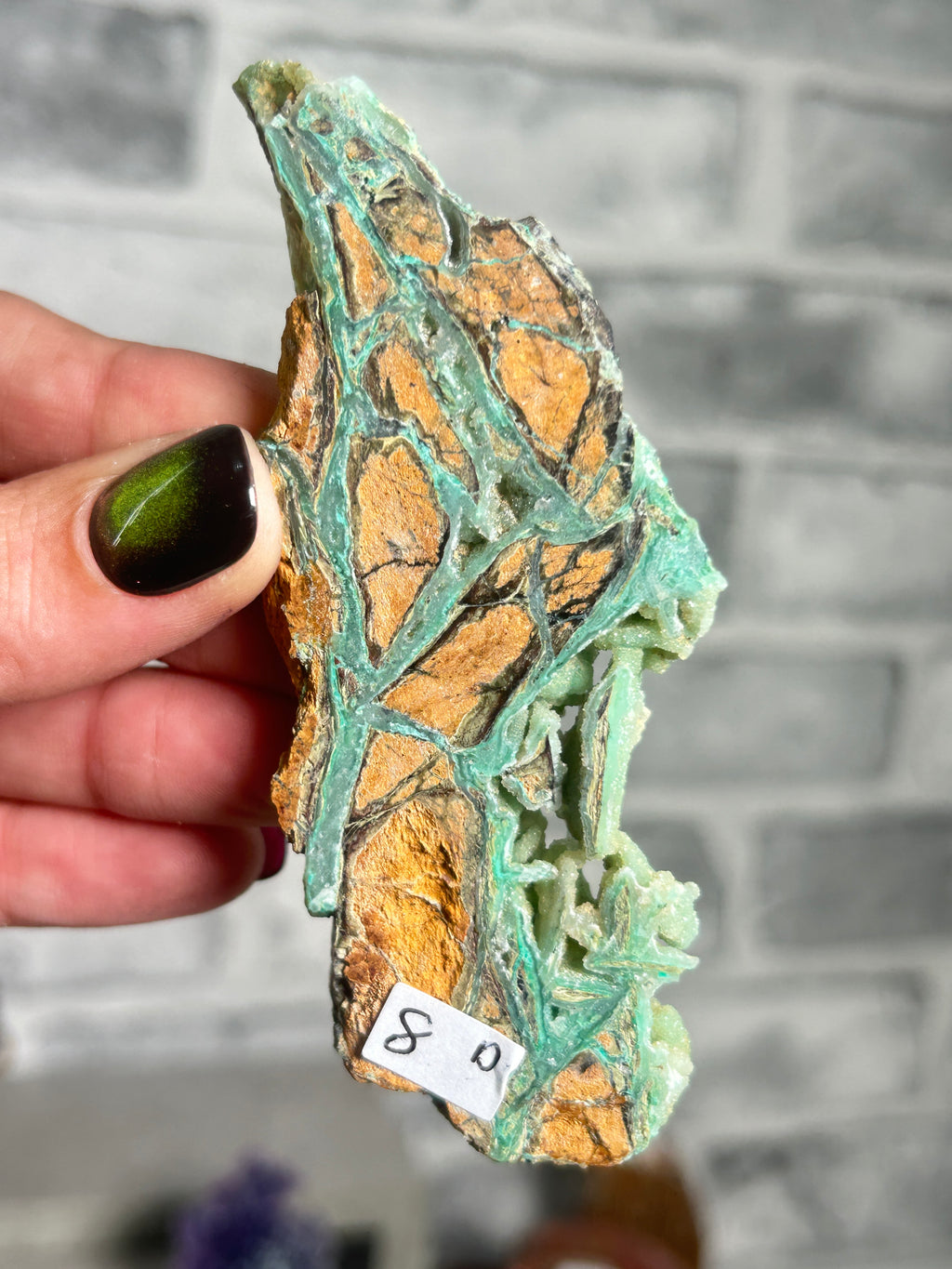 Indonesian Smithsonite trade-name specimen D with vivid green garnierite veining, pale crystalline quartz and rust-orange natural matrix from Indonesia.