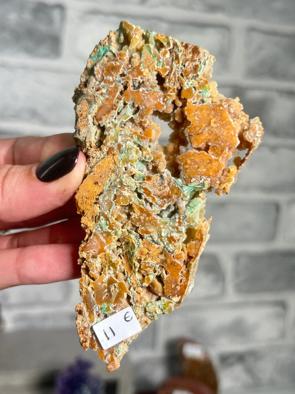Indonesian Smithsonite trade-name specimen E with honey-toned quartz crystal pockets, green garnierite mineralisation and natural matrix from Indonesia.