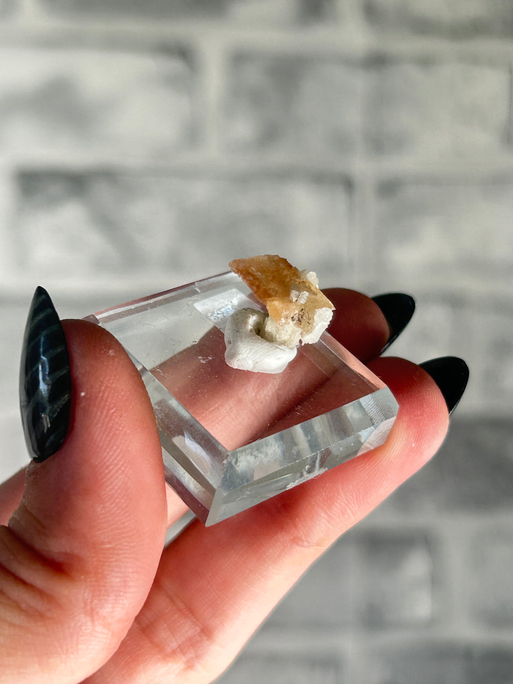 Wulfenite on sugar quartz, Qingyuan, Guangdong Province, China.