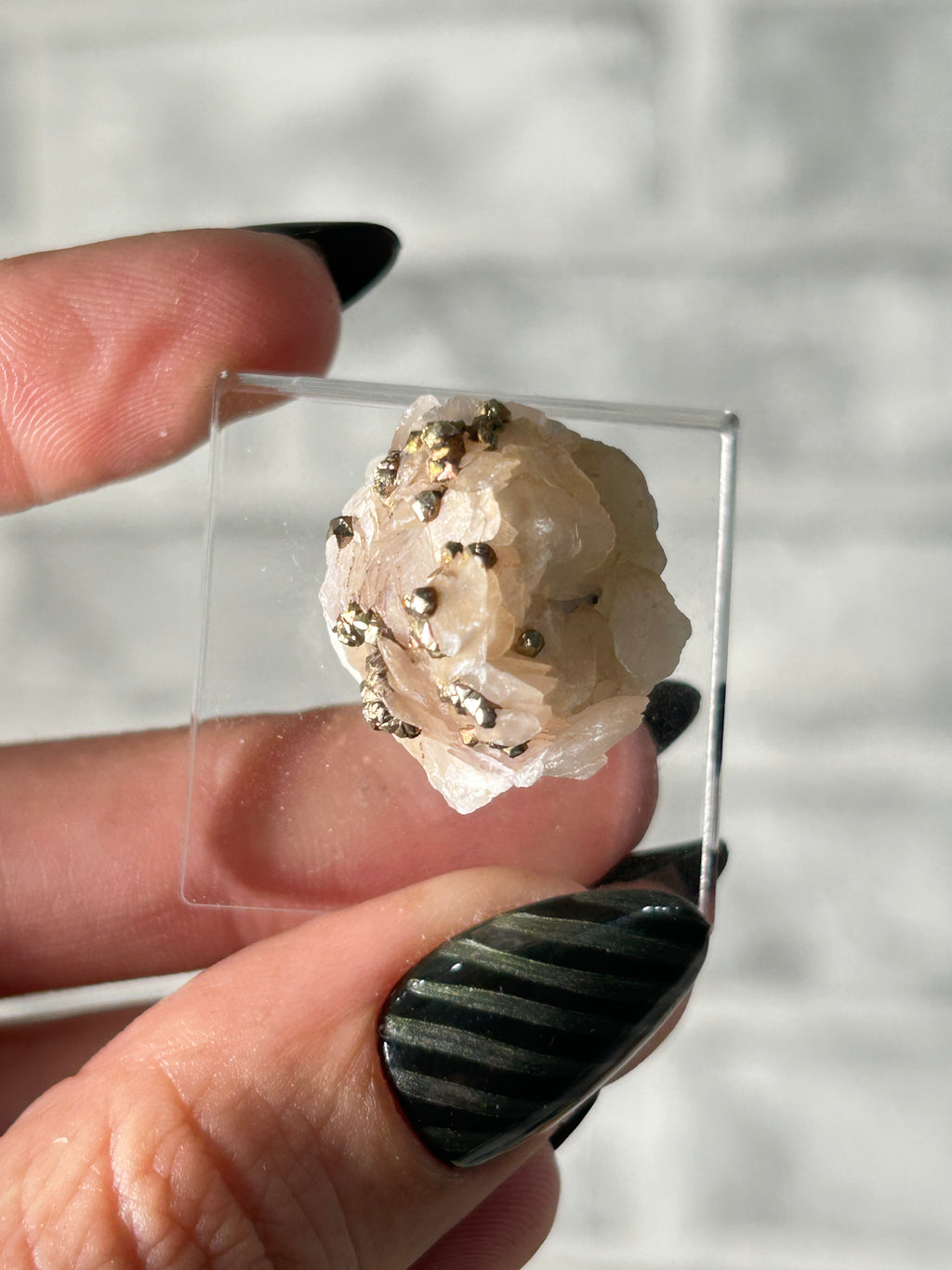 Iridescent pyrite on calcite from inner Mongolia ￼