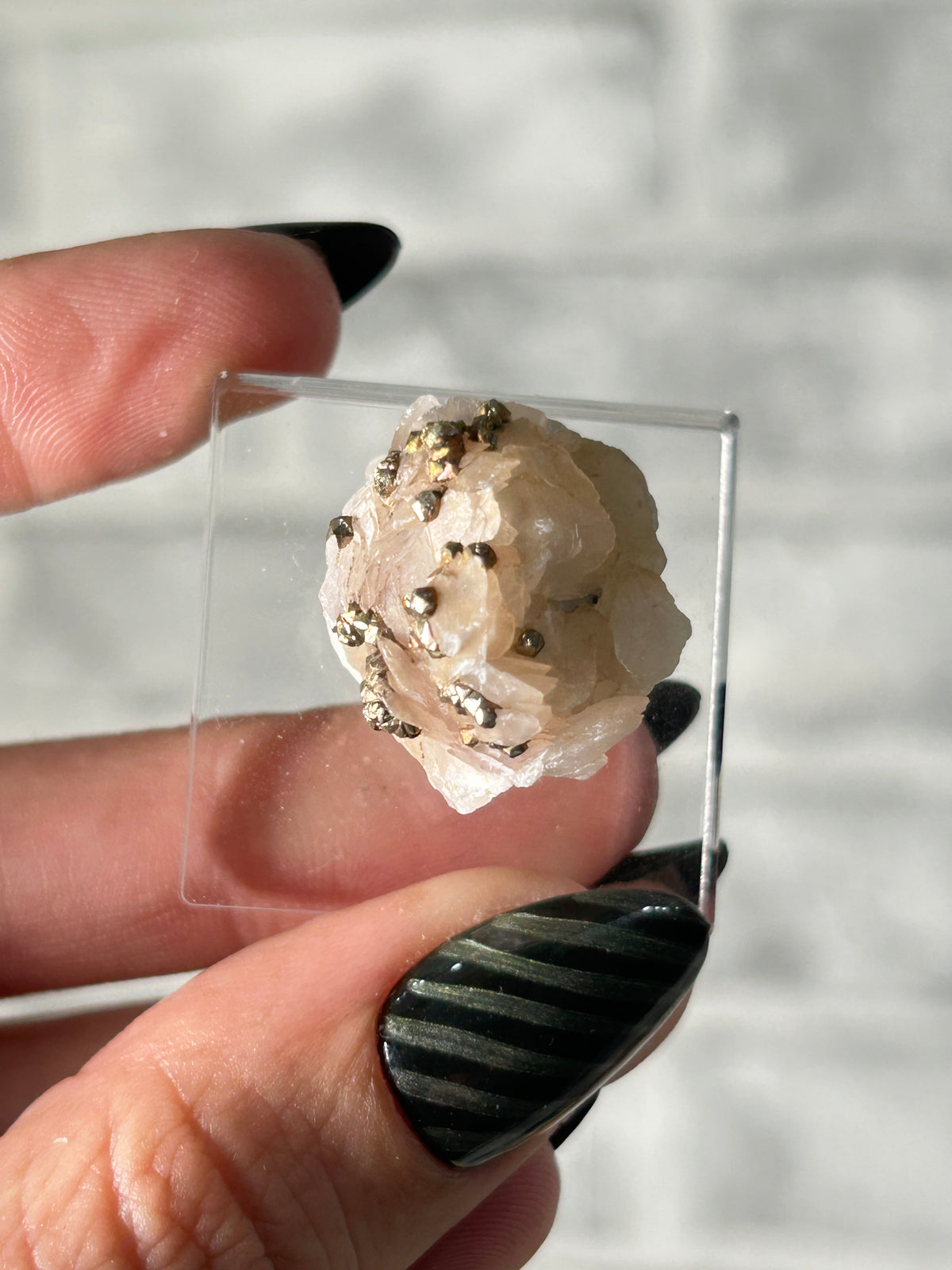 Iridescent pyrite on calcite from inner Mongolia ￼