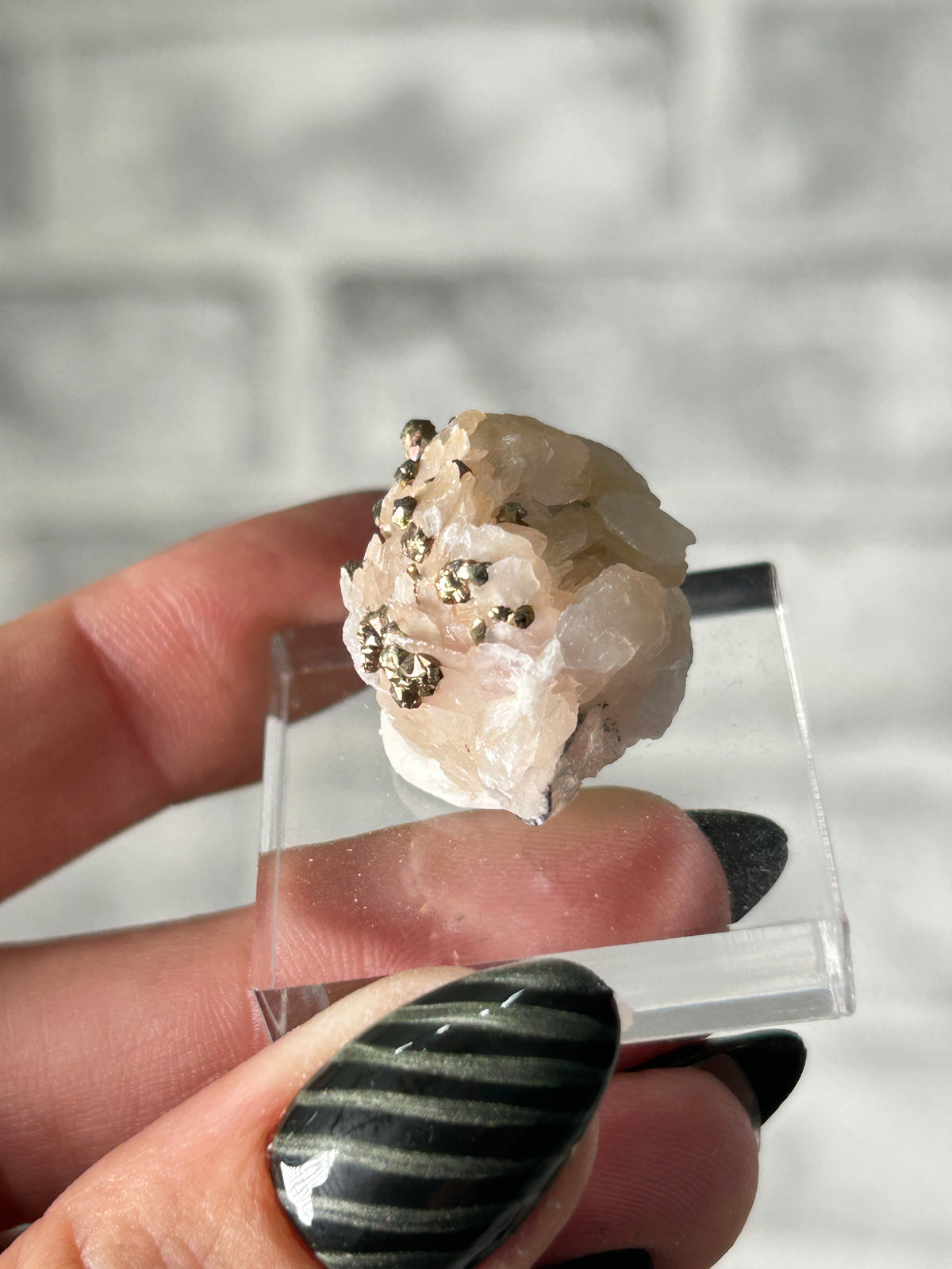 Iridescent pyrite on calcite from inner Mongolia ￼