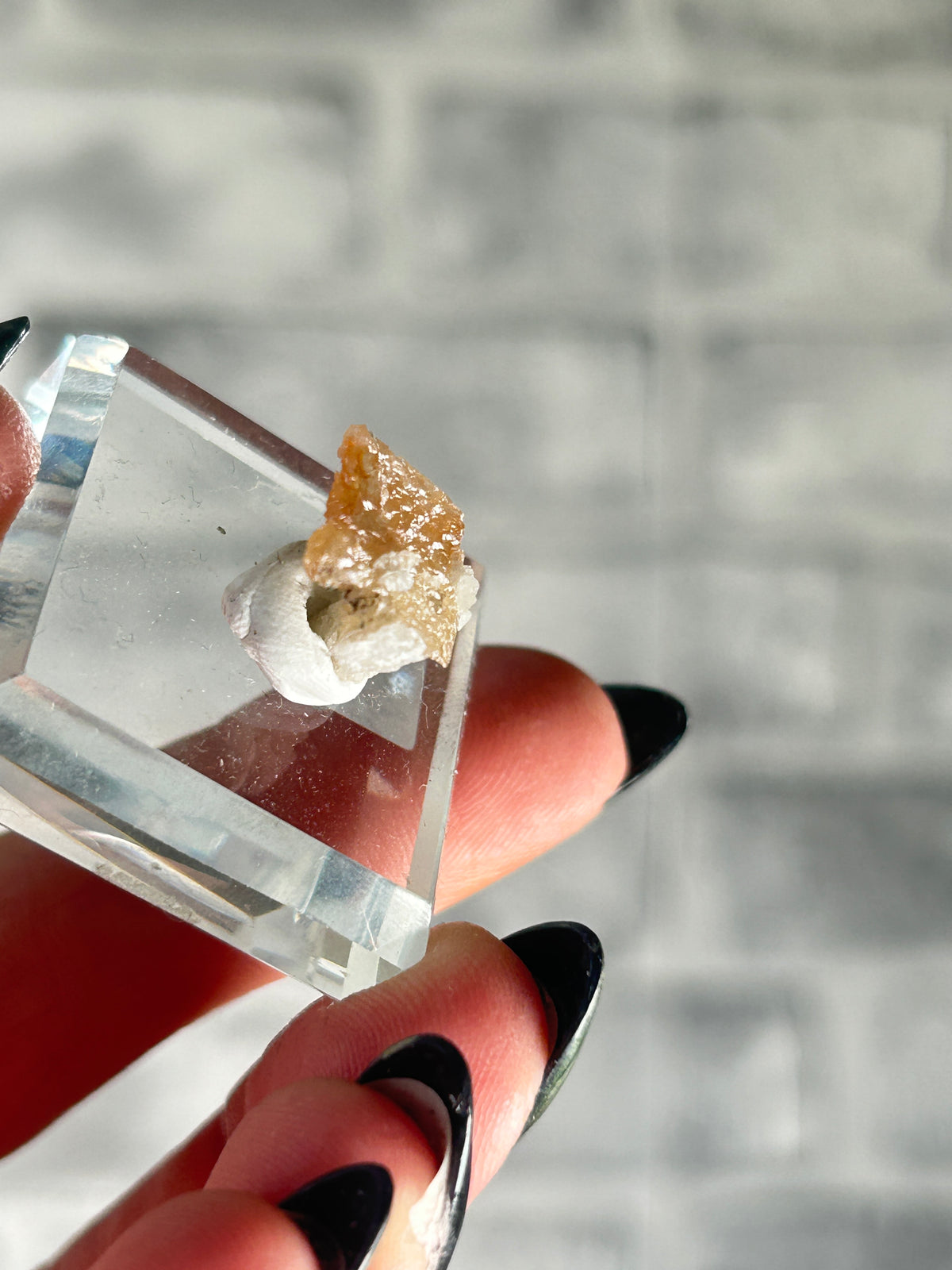 Wulfenite on sugar quartz, Qingyuan, Guangdong Province, China.