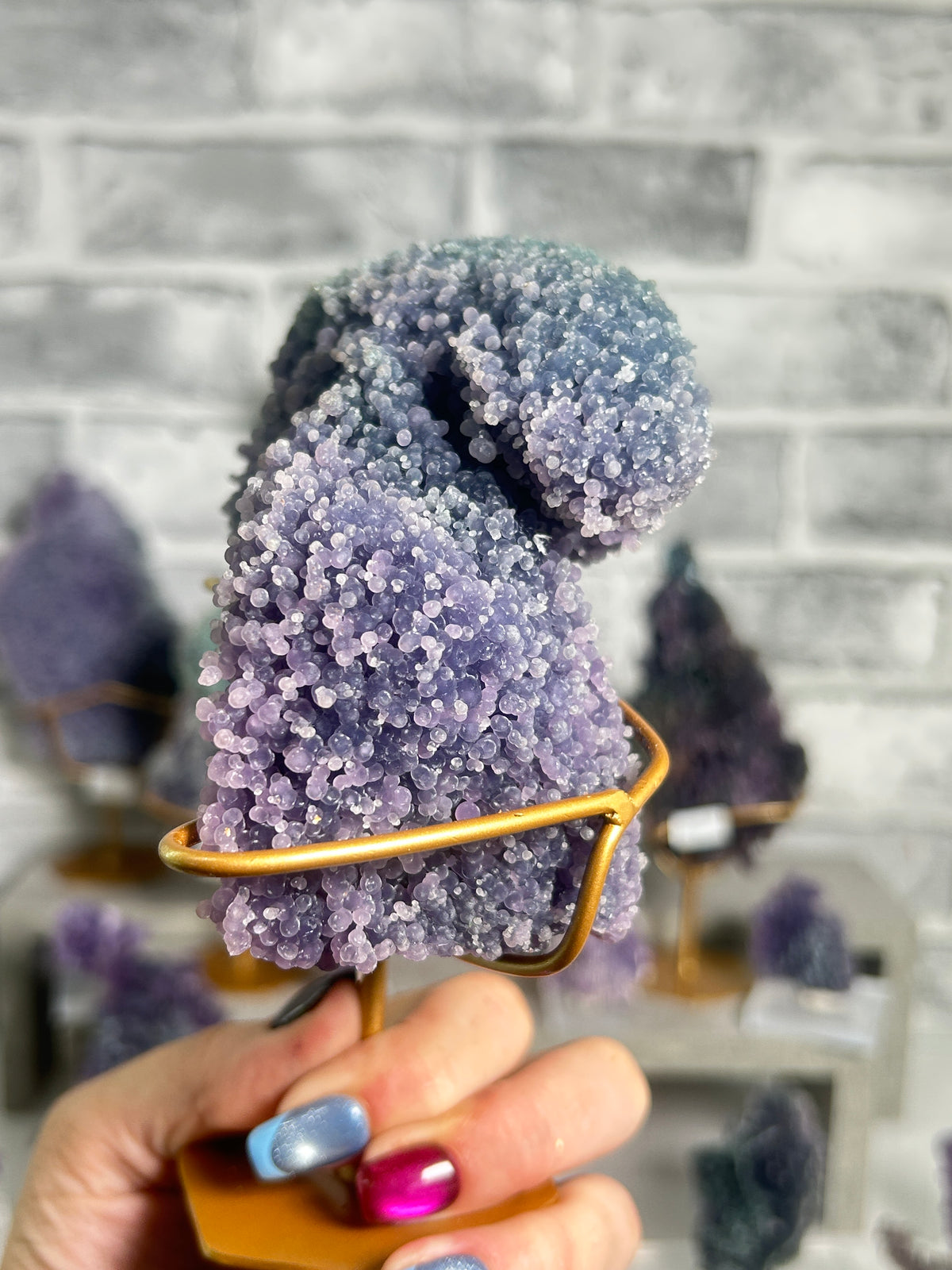 Large blue and lavender Grape Agate specimen from West Java, Indonesia featuring botryoidal chalcedony with sparkling druzy quartz and natural colour zoning.