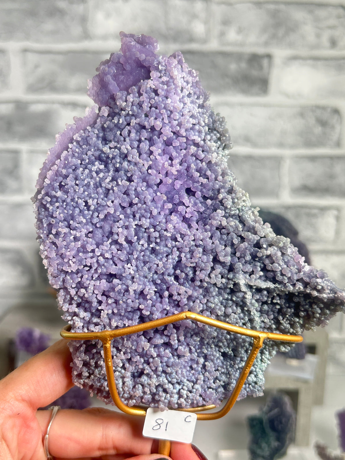 Large natural purple and blue grape agate cluster from West Java, Indonesia with sparkling botryoidal chalcedony crystals on natural matrix.
